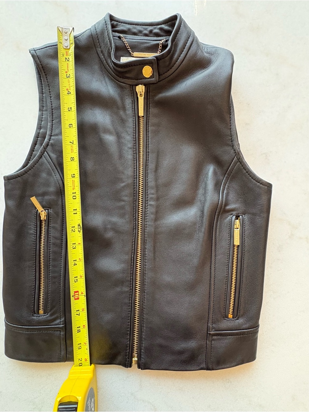 Michael Kors ladies Black Leather Zip Vest with Gold Hardware. Size small.